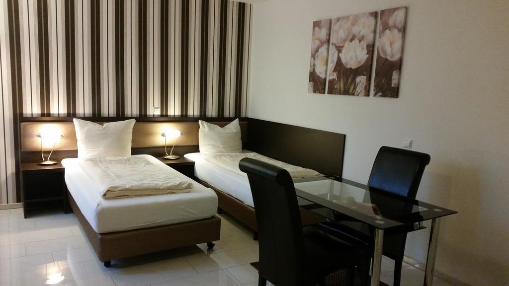 Cityhotel Ahlen Garni Quarto foto
